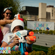 Illustration for article titled Youre never too old for water guns and drench warfare